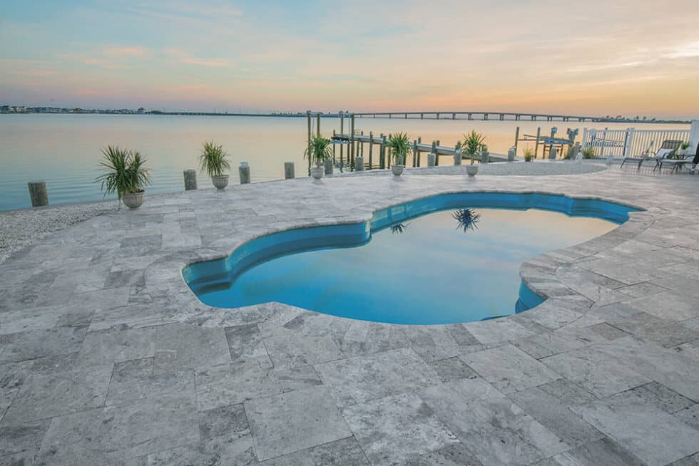 Pool installation process in backyard of home in Little River, SC